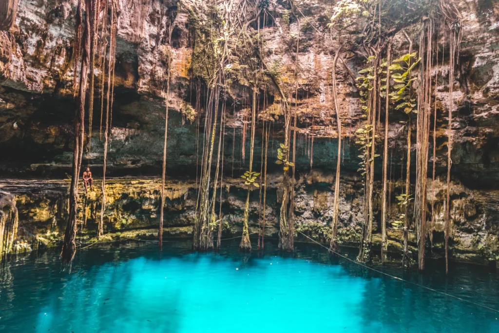 Traveler visiting a freshwater cenote near Macao